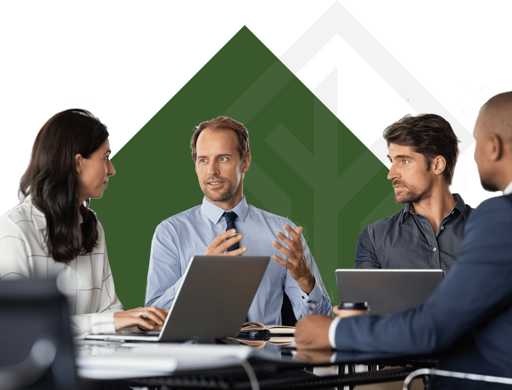a team of four professionals meeting at a desk