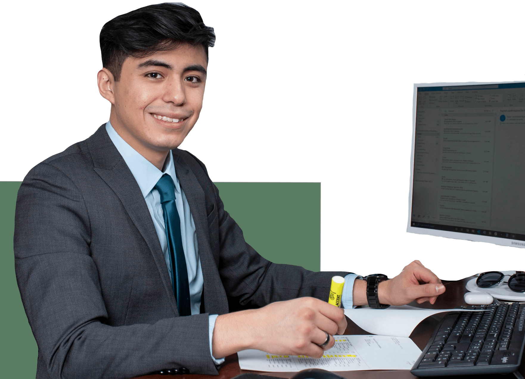 a professional at his desk with a computer