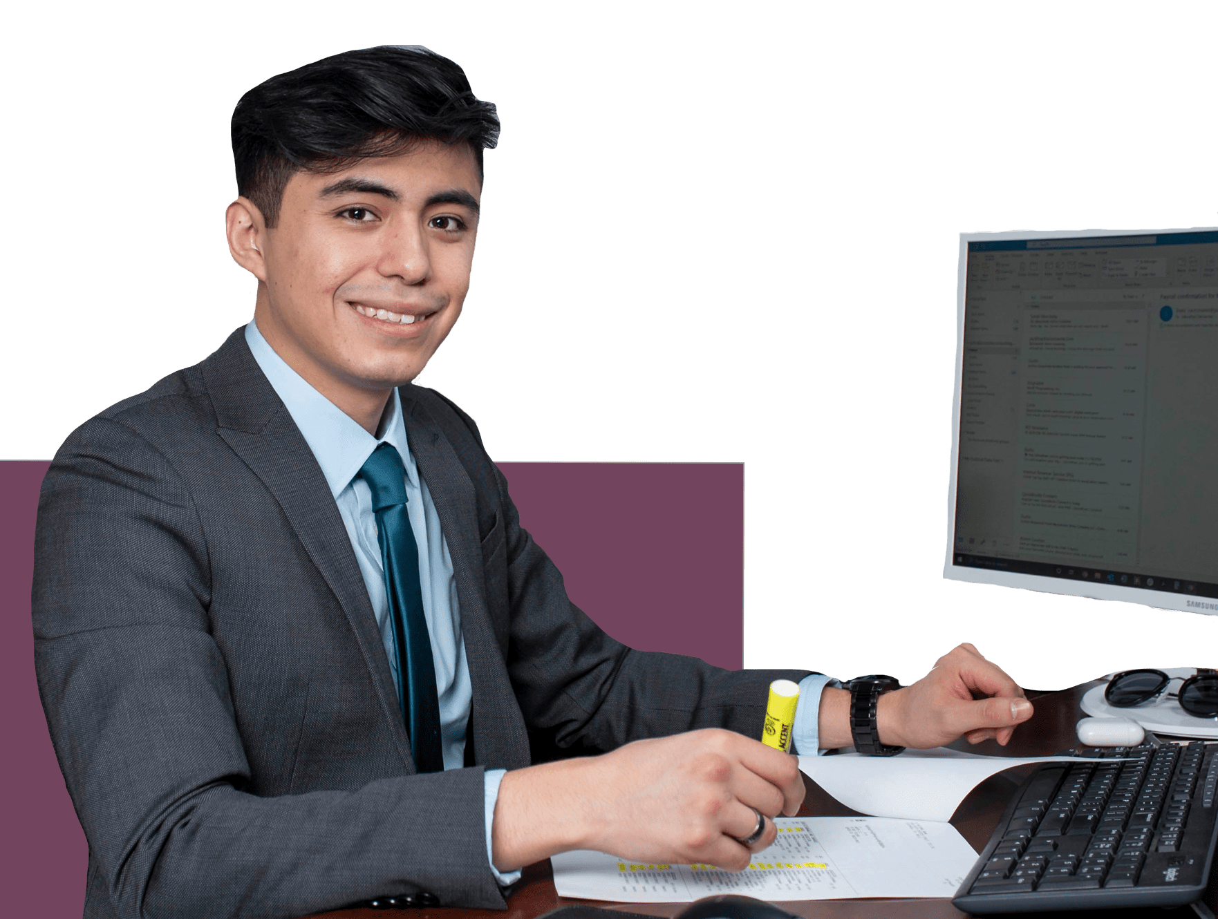 a professional at his desk with a computer