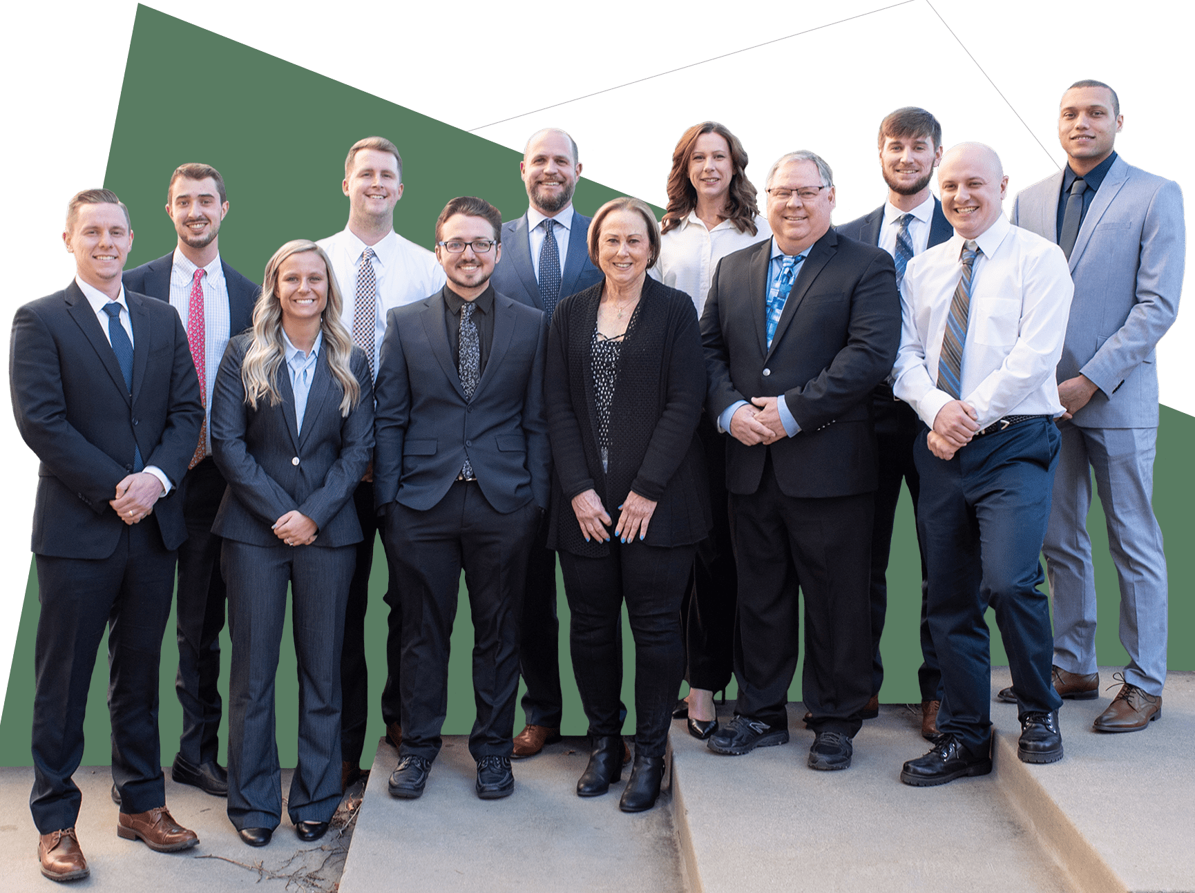 A team of accounting professionals on a staircase.