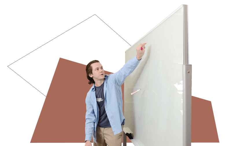 a marketer at a whiteboard