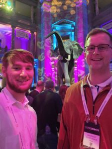 two tax pros at an after-hours conference social