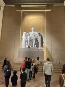 tourists view the Lincoln memorial in Washington D.C.
